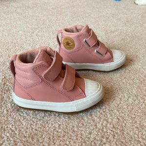 Toddler Converse shoes in blush pink.